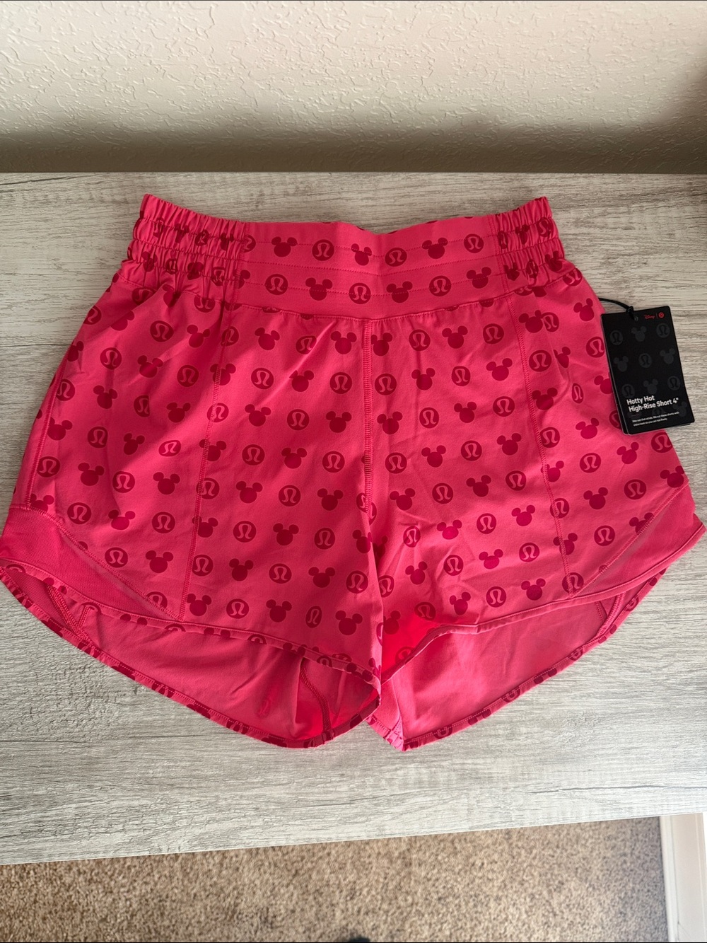 lululemon athletica bright pink Disney print running shorts